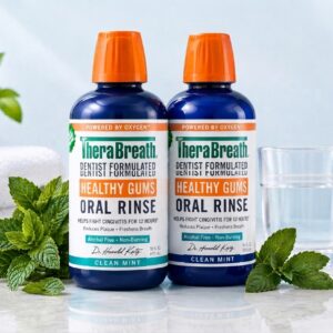 TheraBreath Healthy Gums Oral Rinse Clean Mint bottles